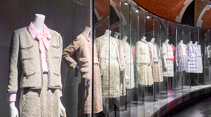 Chanel designs on display at Palais Galliera's Gabrielle Chanel Fashion Manifesto Exhibition, Paris.