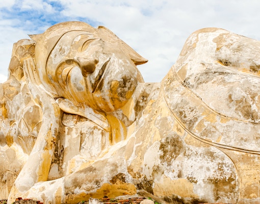 Reclining Buddha statue at Wat Lokayasutharam, Ayutthaya, Thailand.