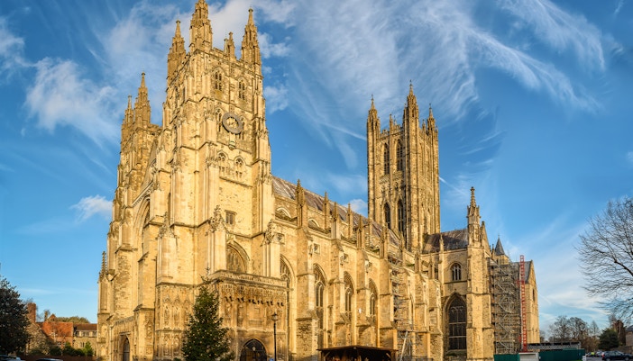 Canterbury Cathedral illuminated by sunset rays, England.
