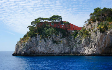 Villa Malaparte perched on a cliff overlooking the sea in Capri, Italy.