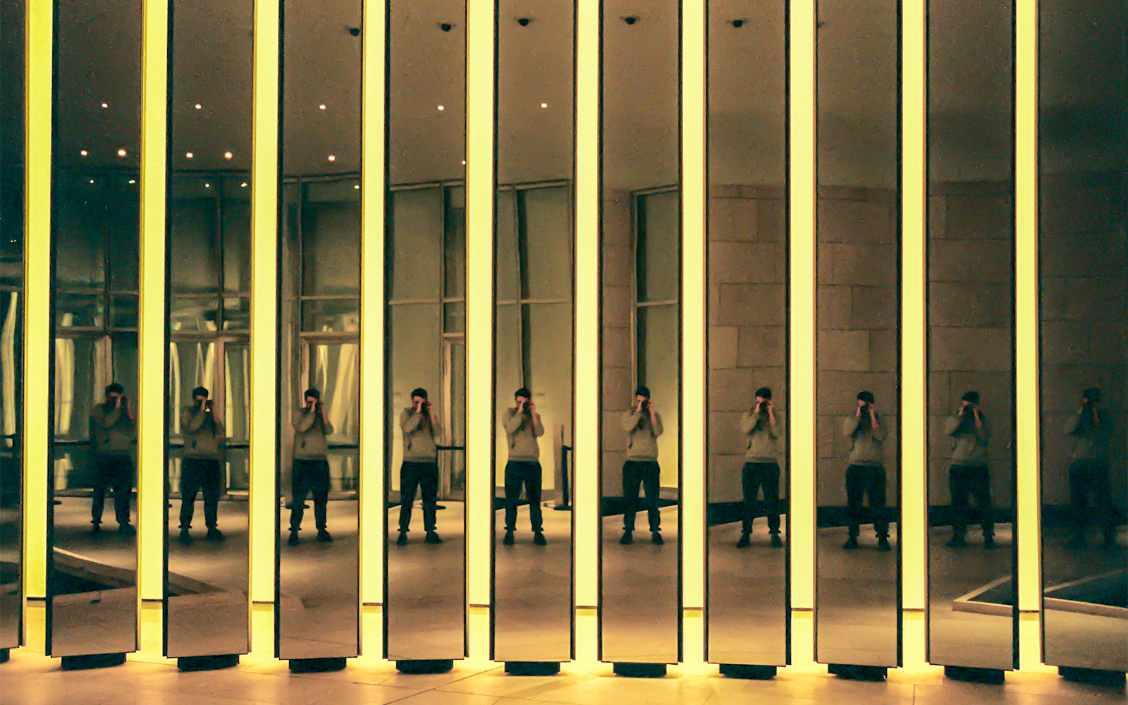 Mirrored reflections inside Fondation Louis Vuitton, Paris.