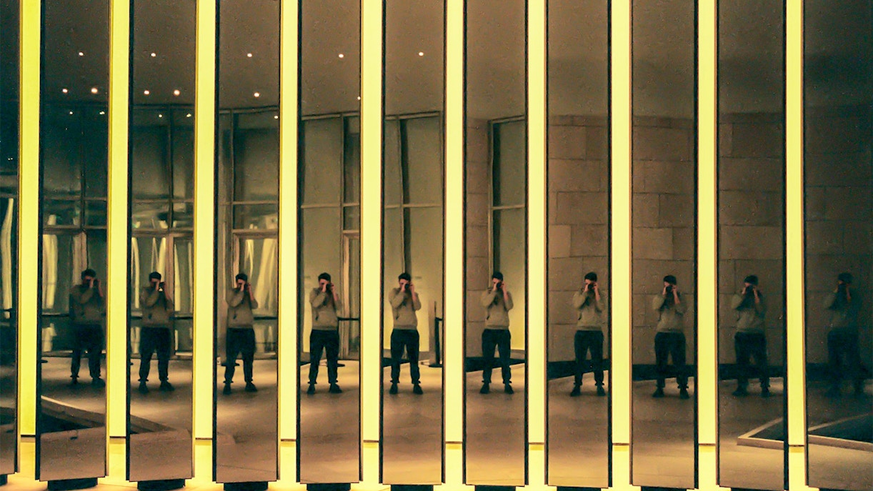 Mirrored reflections inside Fondation Louis Vuitton, Paris.