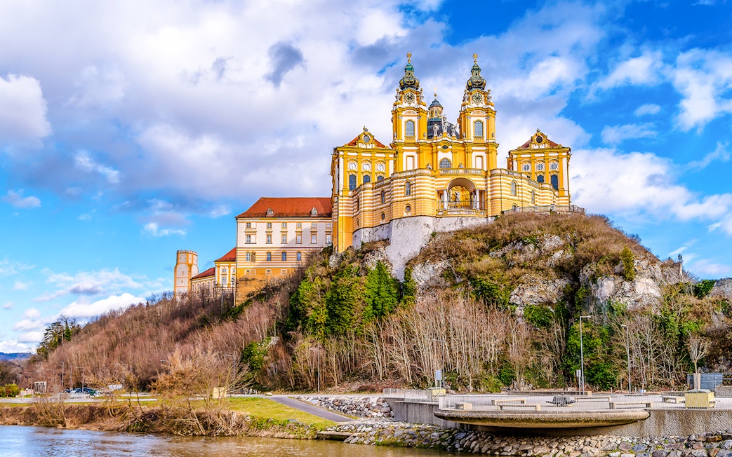 Melk Abbey perched on a hill overlooking the Danube River in Austria.