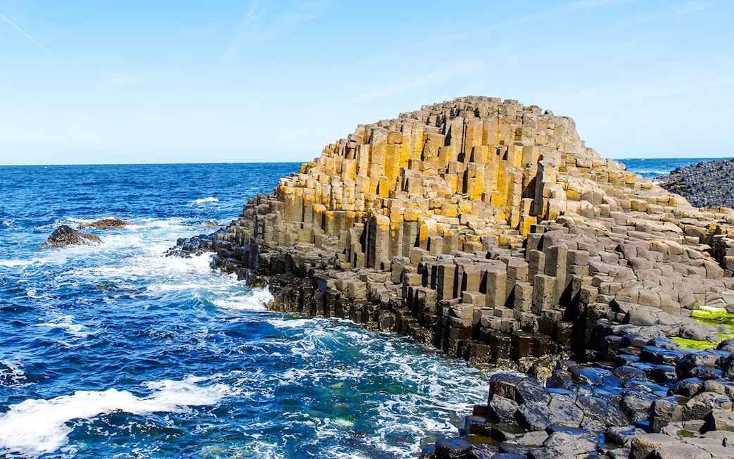 Giant's Causeway basalt columns by the ocean in Northern Ireland.