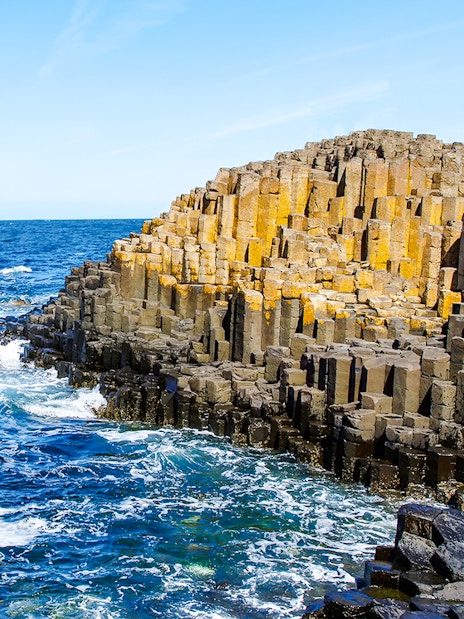 Giant's Causeway basalt columns by the ocean in Northern Ireland.