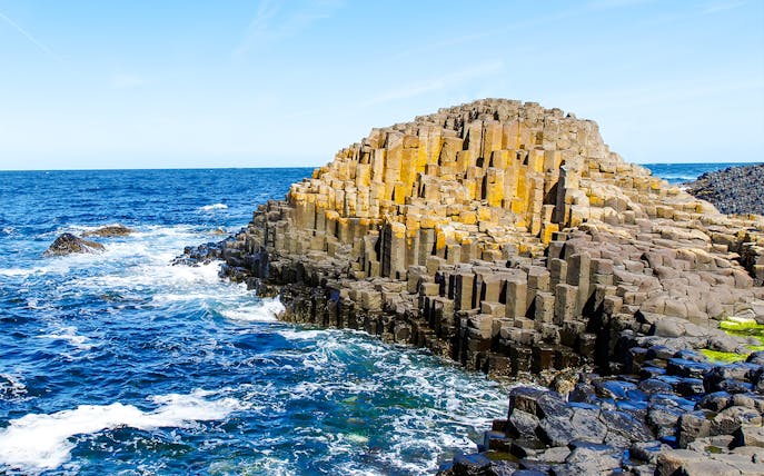 Giant's Causeway basalt columns by the ocean in Northern Ireland.