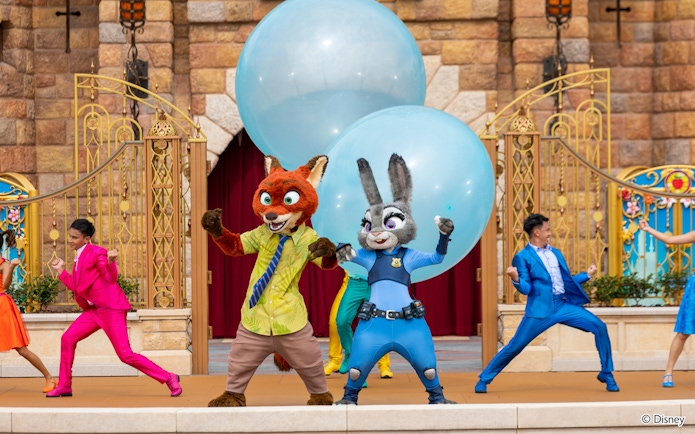 Zootopia characters performing in a parade at Disneyland Hong Kong.