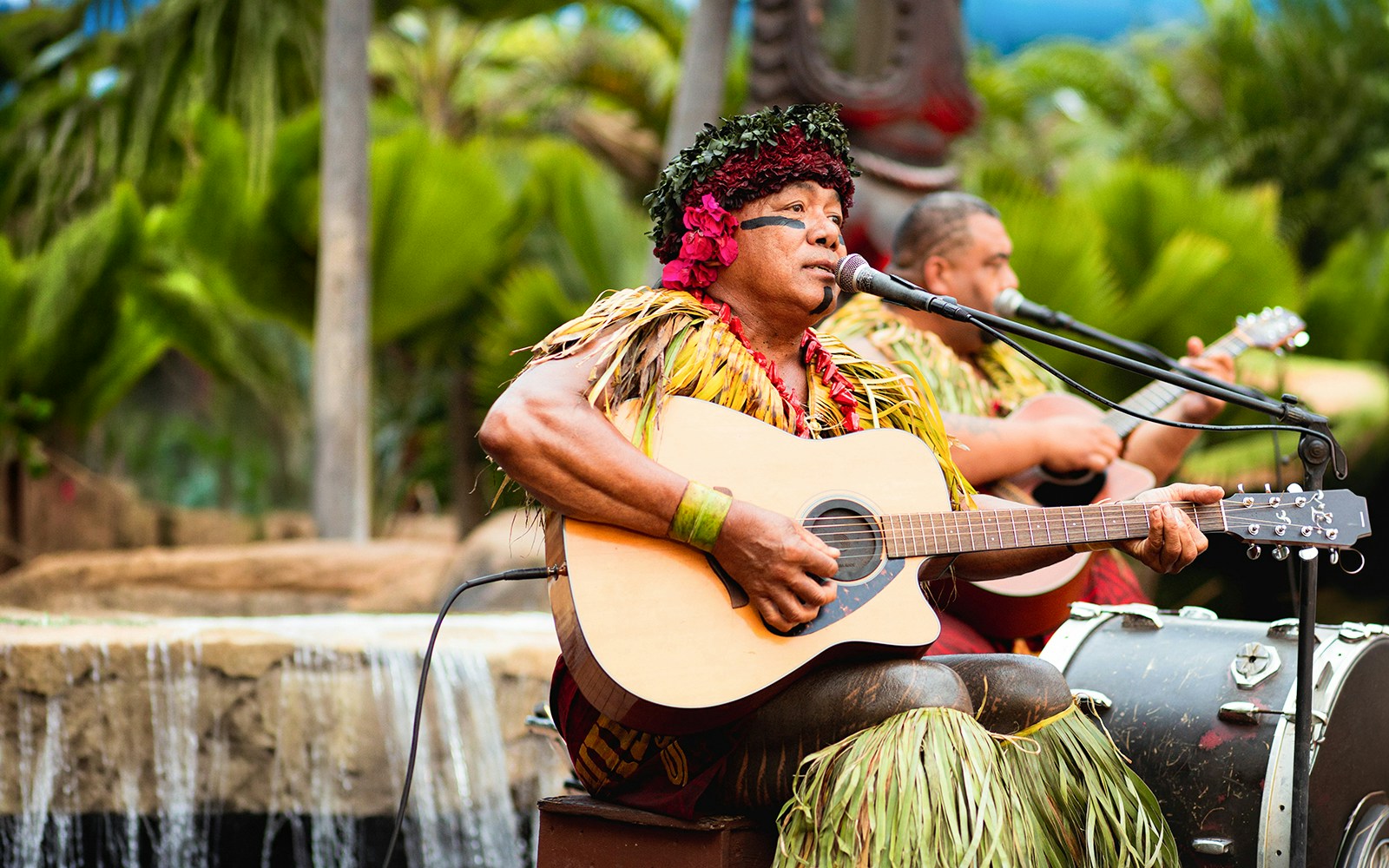 Musician Chief Sielu performing at Chief's Luau, Oahu, Hawaii.