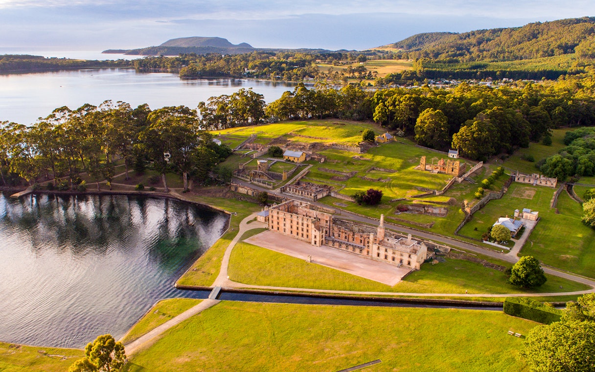 Aerial view of Port Arthur Historic Site with ruins and surrounding landscape in Tasmania, Australia.