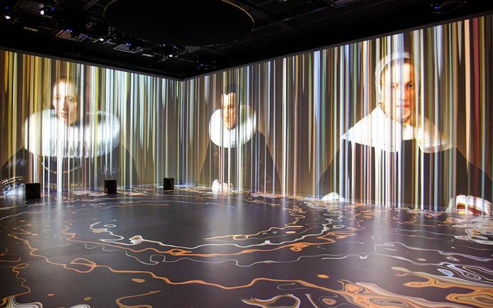 Rembrandt portraits projected in Remastered audiovisual experience, Rotterdam.