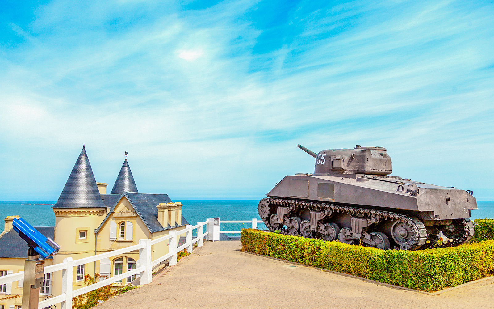 Old World War II tank overlooking the coast of Arromanches, Normandy.