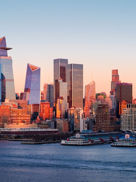 New York City skyline at sunset viewed from a helicopter tour.