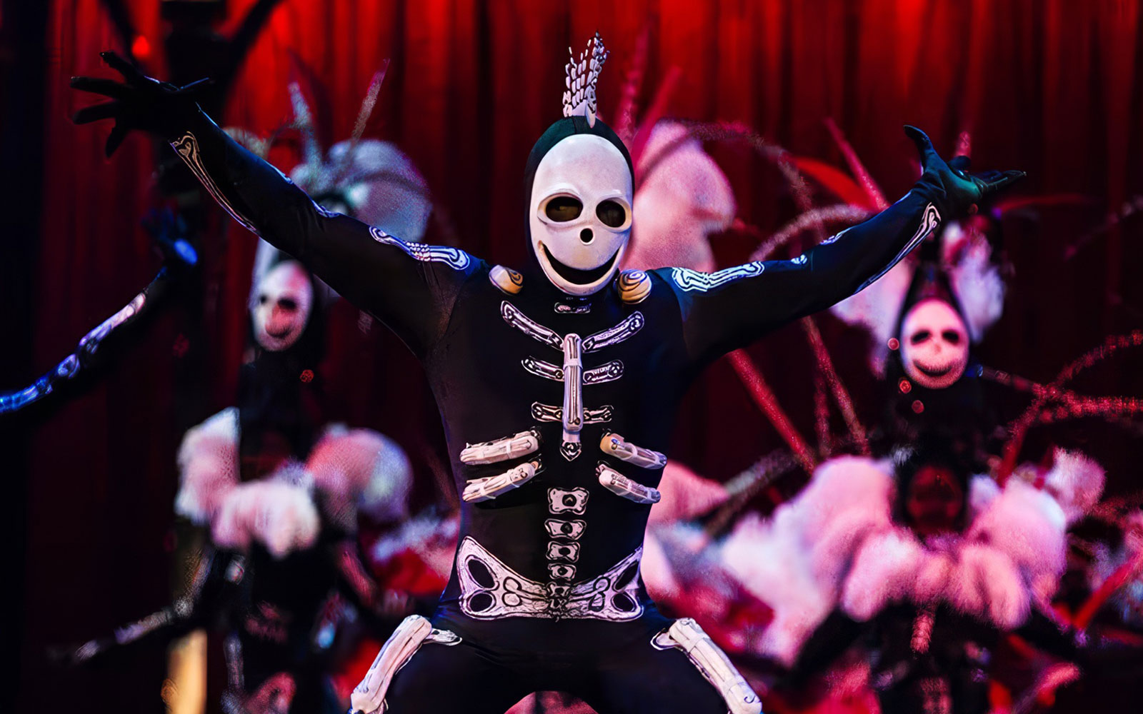 Artists performing in skeleton costumes at Cirque du Soleil Kooza, Singapore.