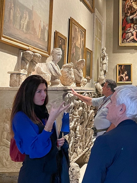 Tour group exploring art and sculptures at Doria Pamphilj Gallery in Rome.