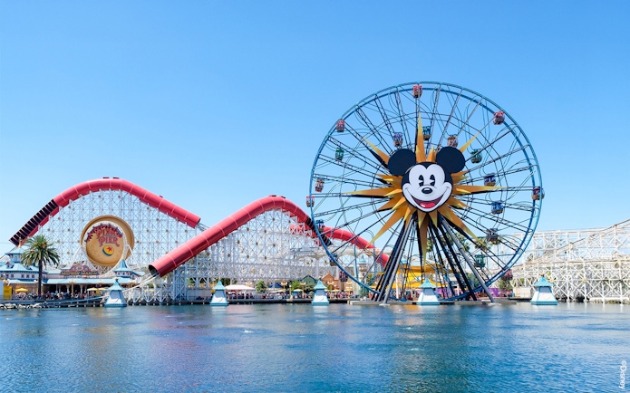 Ferris wheel and roller coaster at Paradise Pier, Disneyland Adventure Park, California.