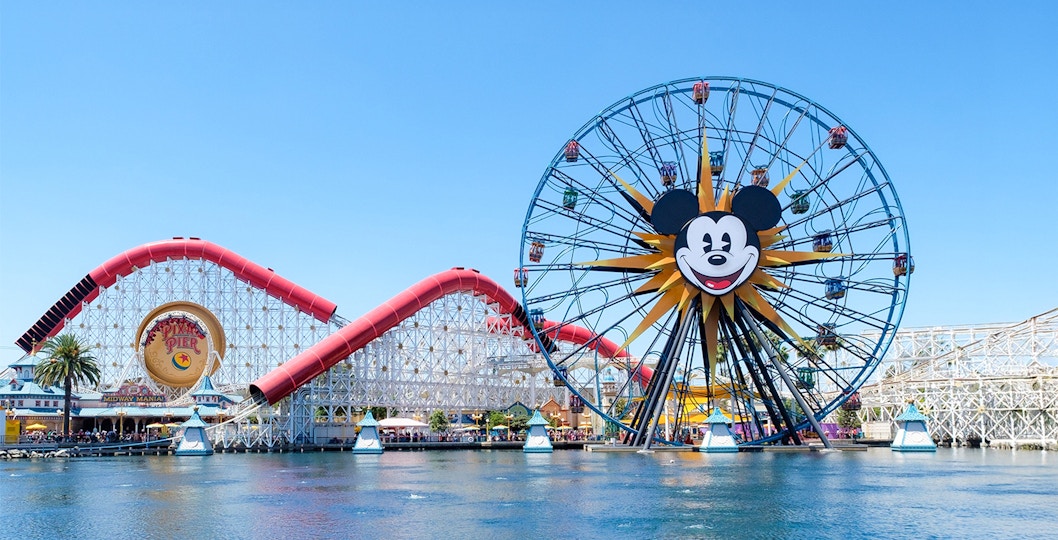 Ferris wheel and roller coaster at Paradise Pier, Disneyland Adventure Park, California.