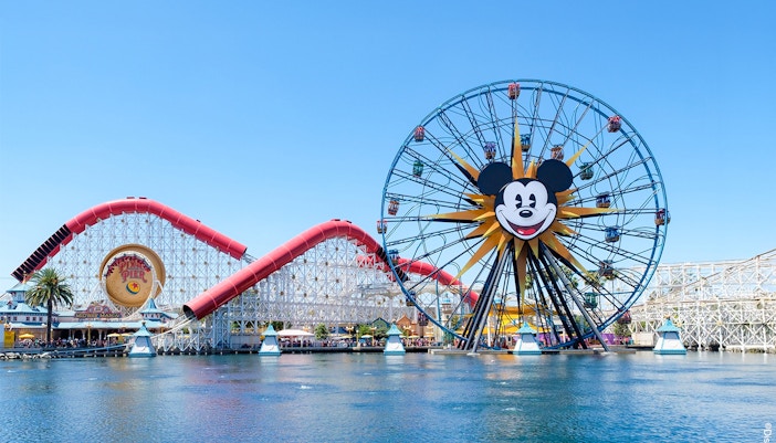 Ferris wheel and roller coaster at Paradise Pier, Disneyland Adventure Park, California.