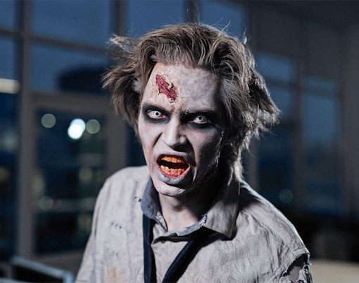 Zombie character at Blood Manor attraction in NYC.