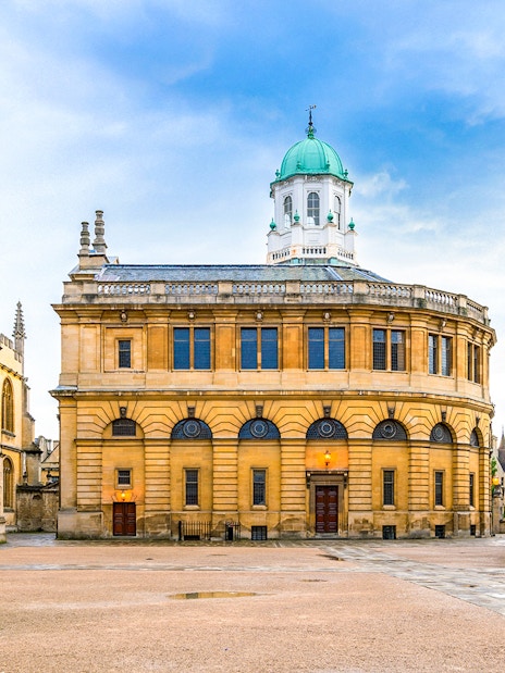 Sheldonian Theatre in Oxford with its distinctive dome and surrounding historic architecture.