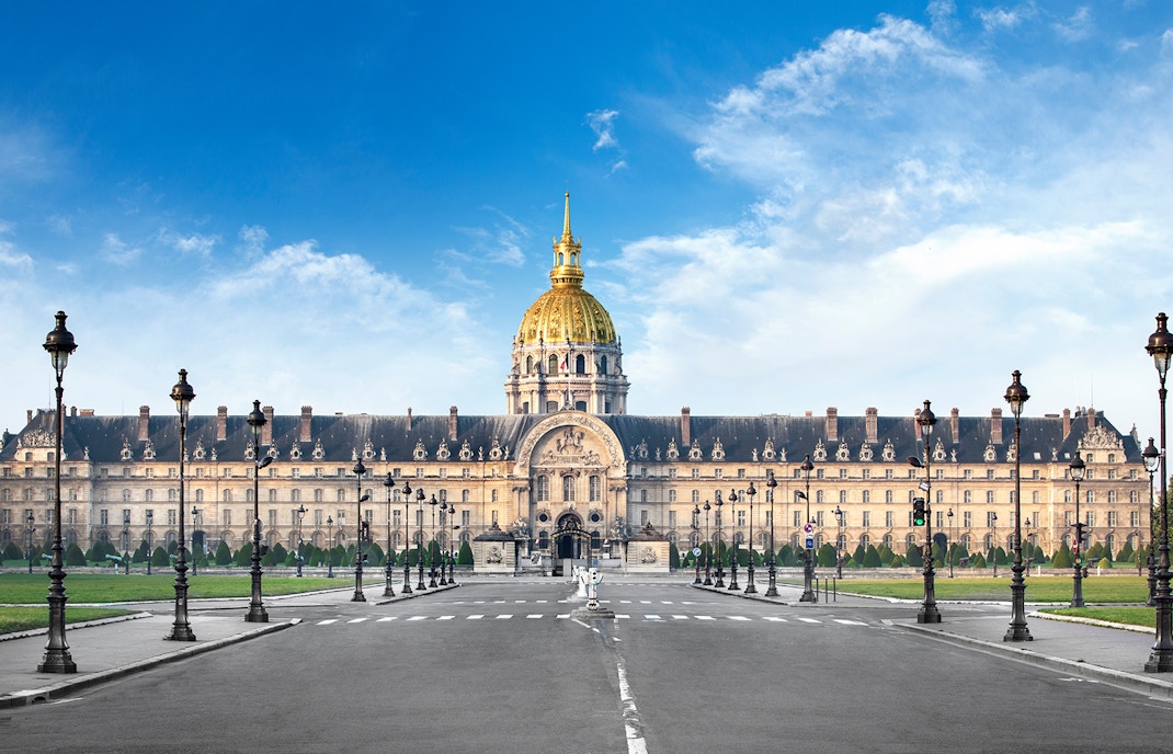 Les Invalides exterior with golden dome in Paris, France.