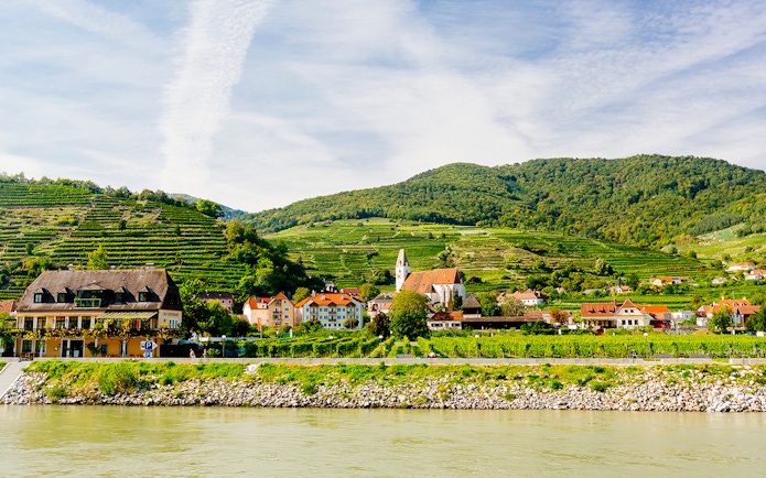 Wachau Valley vineyards and village view from the Danube River, Melk, Austria.