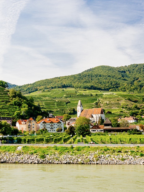 Wachau Valley vineyards and village view from the Danube River, Melk, Austria.