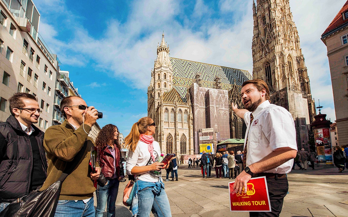 Tour guide with group at St. Stephen's Cathedral, Vienna, during Big Bus tour.