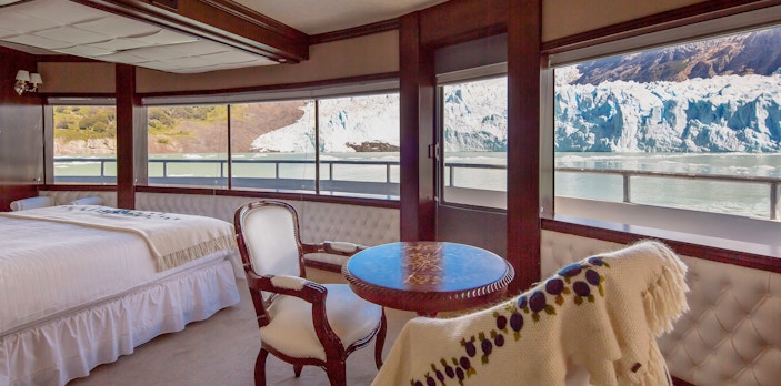 Cabin interior with glacier view on Spirit of the Glaciers tour boat.