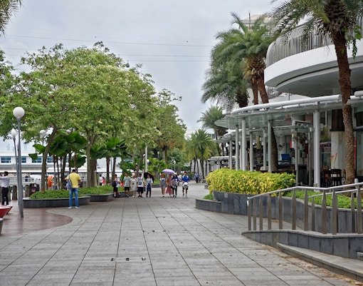 Shoppers walking along the promenade near VivoCity, Singapore.