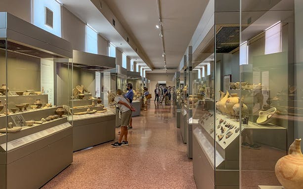 Exhibits of ancient pottery inside National Archaeological Museum.