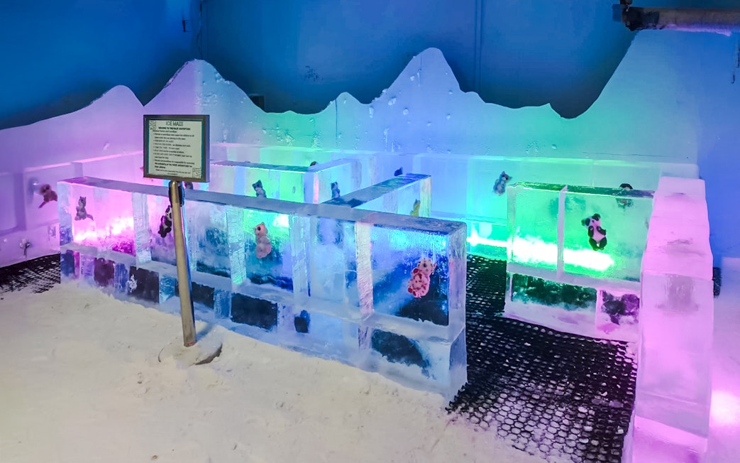 Ice maze with colorful lights and ice walls at Snow Village, Singapore Snow City.