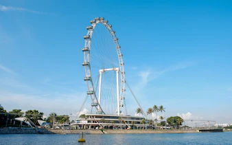 Singapore Flyer against blue sky during The Original DUCKtours Singapore.