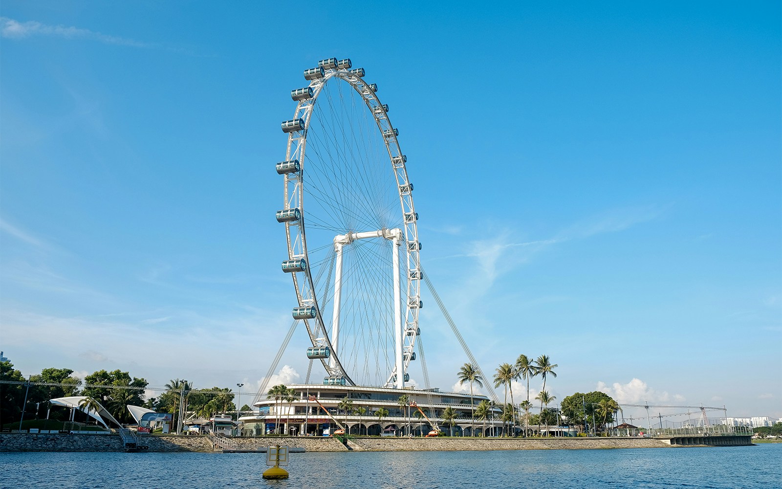 Singapore Flyer against blue sky during The Original DUCKtours Singapore.