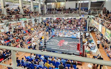 Crowd watching a Muay Thai match at Bangla Boxing Stadium in Phuket.