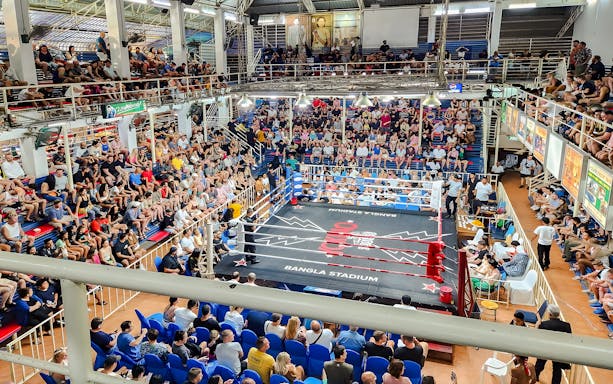 Crowd watching a Muay Thai match at Bangla Boxing Stadium in Phuket.