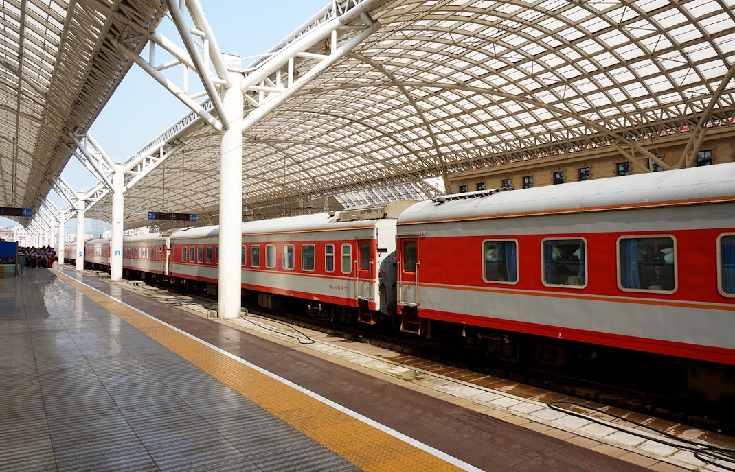 Train at a modern station platform, related to Rijksmuseum tour.