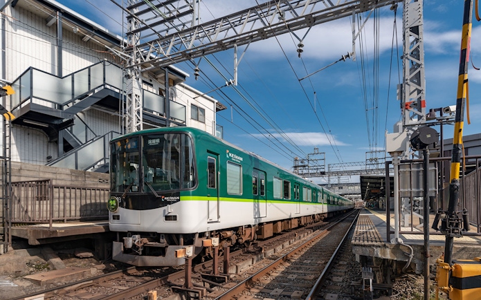 Kansai train at station under blue sky, part of Have Fun in Kansai 1 Week Pass.