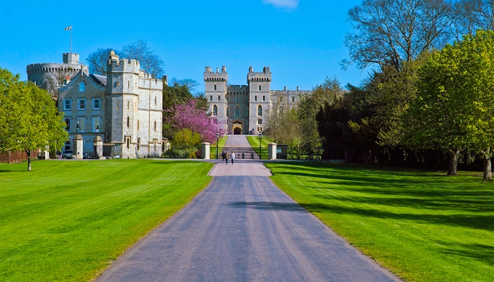 Windsor Castle entrance with pathway and surrounding gardens.