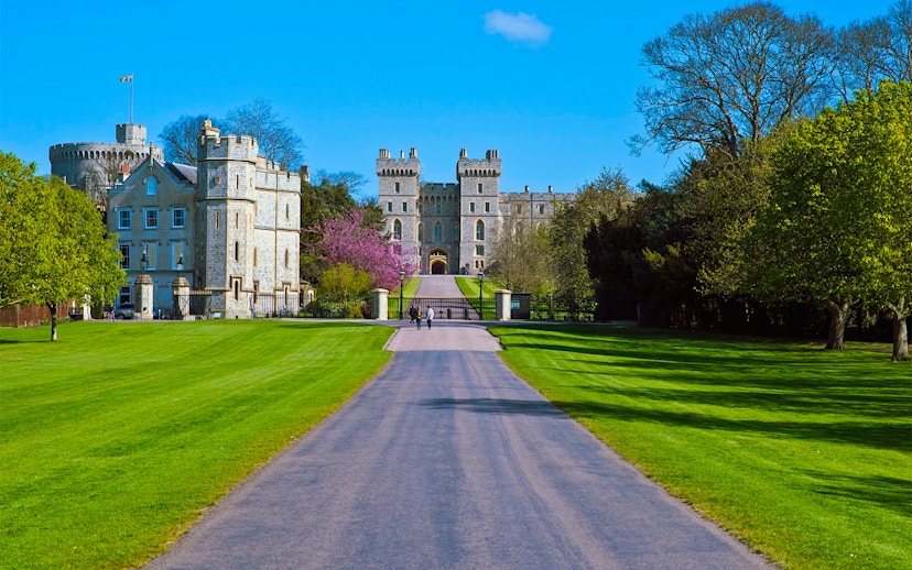Windsor Castle entrance with pathway and surrounding gardens.