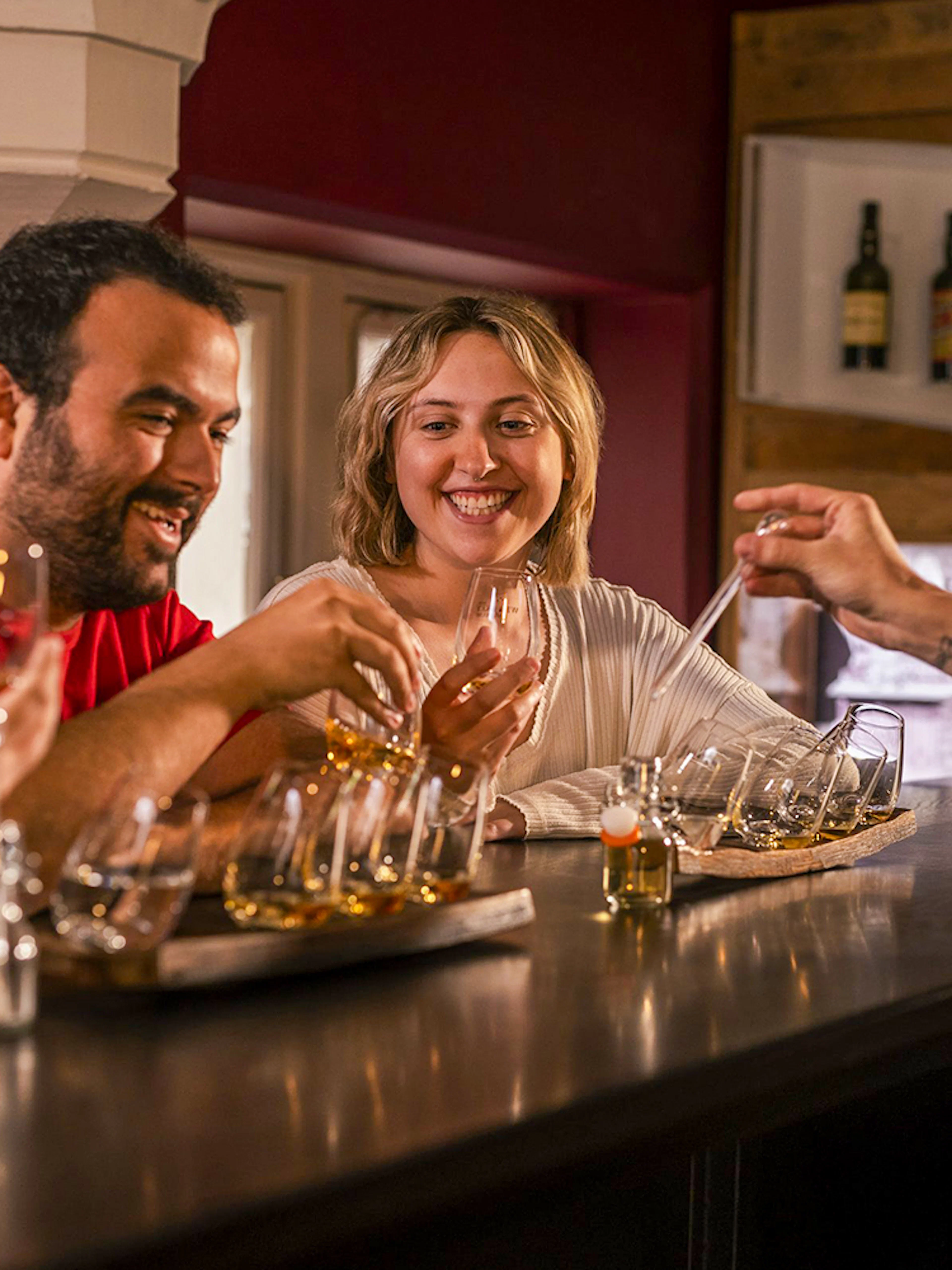 Guests enjoying whiskey tasting at the Irish Whiskey Museum tour.