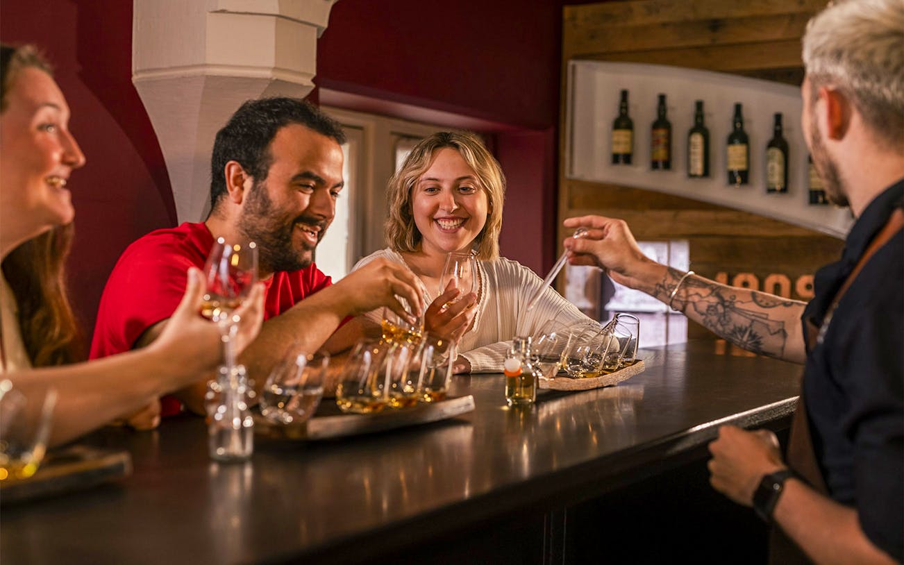 Guests exploring exhibits at the Irish Whiskey Museum in Dublin during a premium tour.
