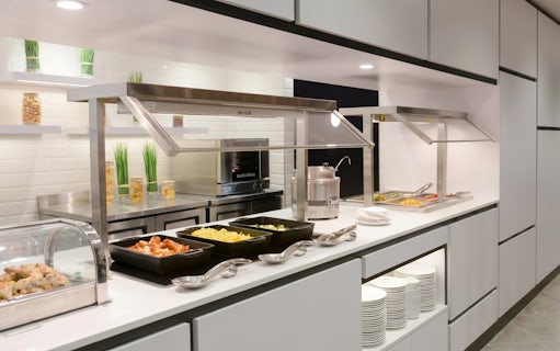 Buffet with hot dishes at Plaza Premium Lounge, Terminal 3, Toronto Pearson Airport.