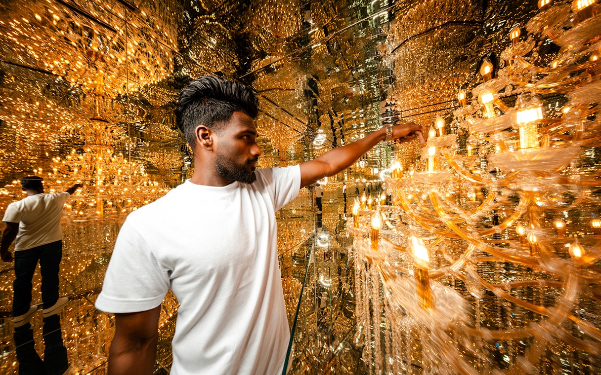 Visitors interacting with illuminated displays at House of Hype.