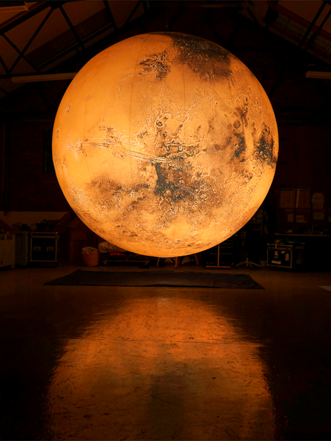Illuminated globe installation at Singapore Future World Exhibition.