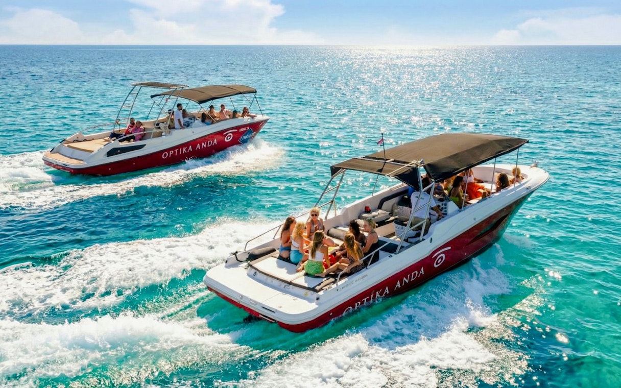 Speedboats on Blue Lagoon, Ciovo & Trogir tour with passengers enjoying the ride.