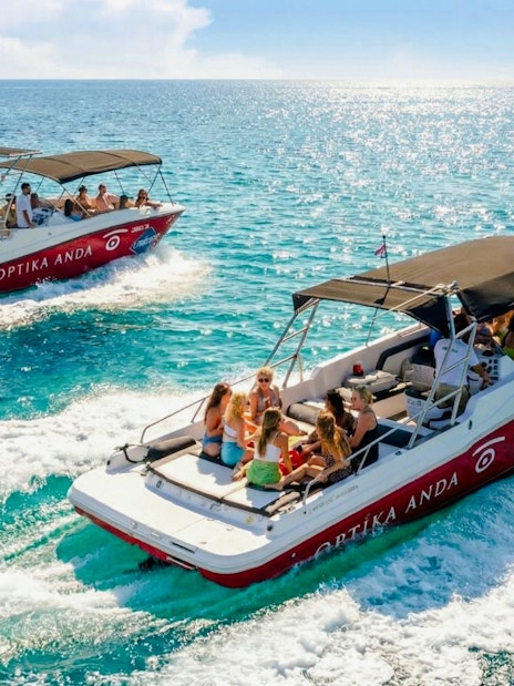 Speedboats on Blue Lagoon, Ciovo & Trogir tour with passengers enjoying the ride.