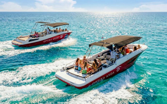 Speedboats on Blue Lagoon, Ciovo & Trogir tour with passengers enjoying the ride.