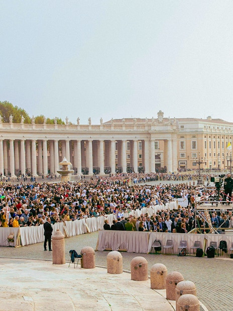 Crowd gathered at St. Peter's Square, Vatican City, for a mass event.