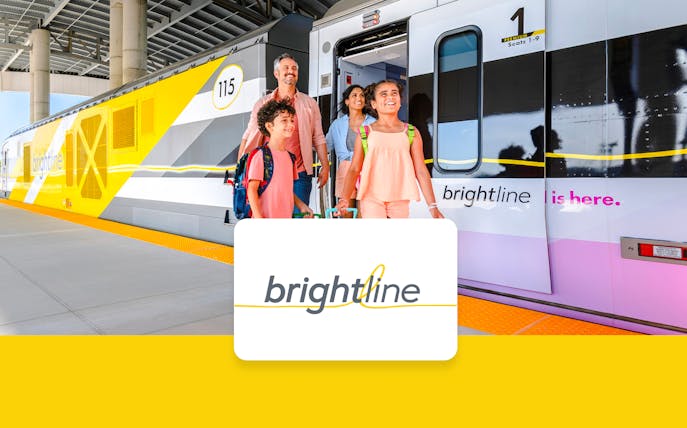 Brightline train with passengers boarding, Miami to Orlando route.
