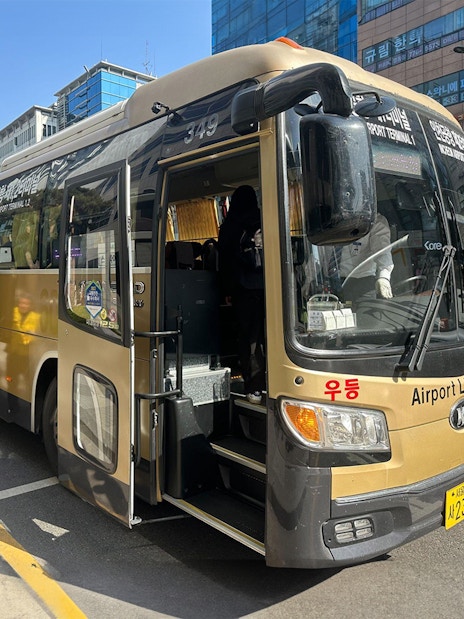Incheon Airport Limousine Bus parked on a street in Seoul.